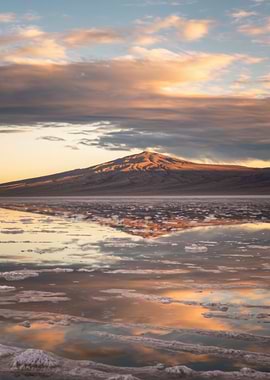 Mountain Reflection in Water at Sunset