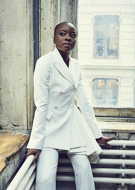 Woman in White Suit by Window