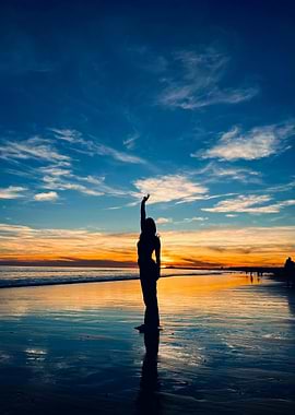 Silhouette on Beach at Sunset