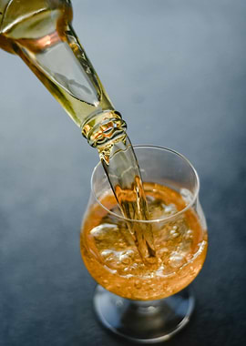 Pouring Beer into Glass