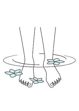 Feet in water with flowers