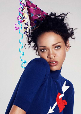 rihanna in party hat and sweater