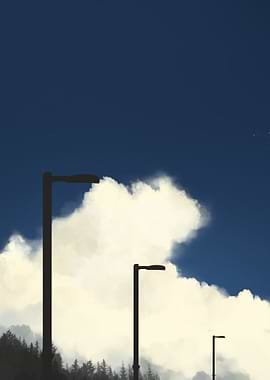 Streetlights against a cloudy blue sky