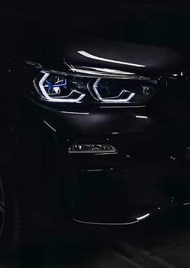 Black Car Headlights Close-Up