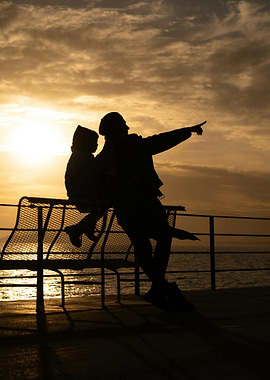 Father and Child Silhouette at Sunset