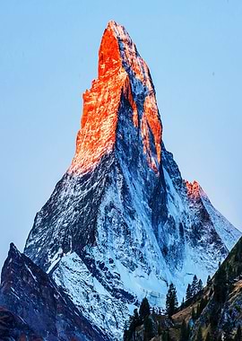 Snowy Mountain Peak at Sunrise