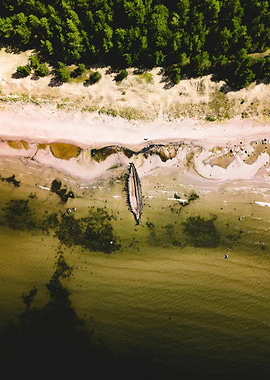 Aerial view of shipwreck on beach