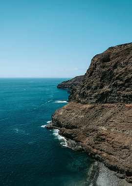 Coastal Cliffside View with Blue Ocean