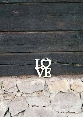 Love Sign on Stone and Wood