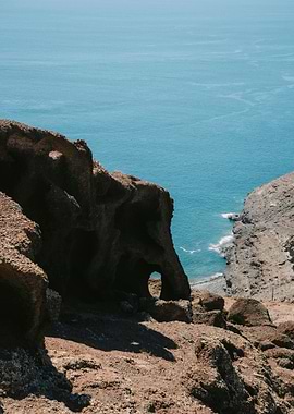 Coastal Cliffside View with Turquoise Sea
