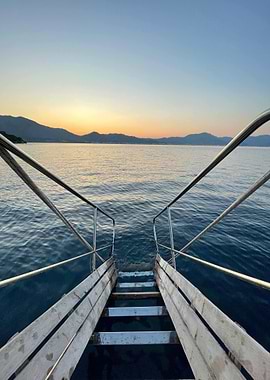 Stairs into the sea at sunset