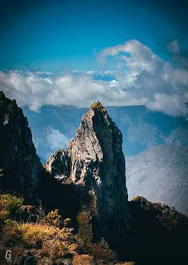 Mountain Peak Landscape with Cloudy Sky