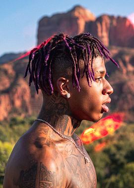 nle choppa portrait with mountain backdrop