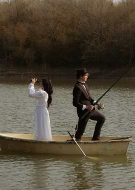 Victorian couple in a rowboat