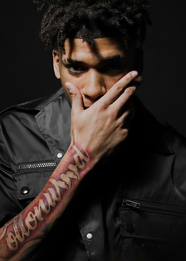 portrait of nle choppa with tattoo