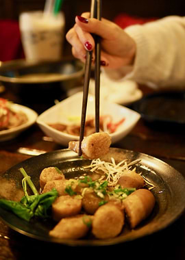 Asian cuisine with chopsticks and food