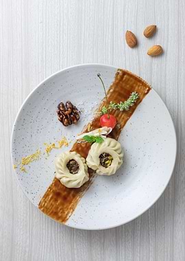 Gourmet Dumpling Dish with Cherry