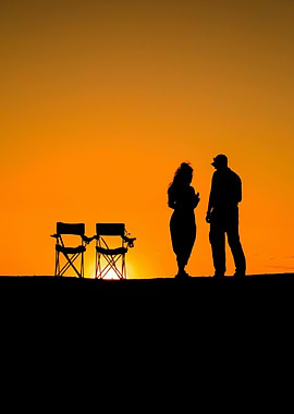 Silhouette of couple at sunset