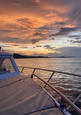 Boat at Sea During Sunset
