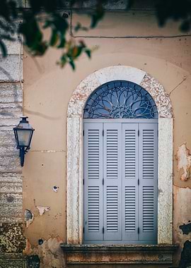 Old Window with Shutters and Lamp