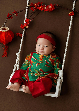 Baby on Swing with Asian Decor