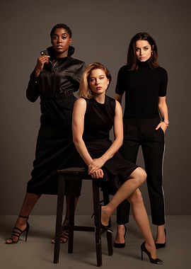 Three Women in Black Attire