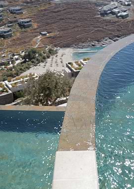 Infinity Pool Overlooking Coastal Landscape