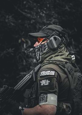 Soldier in tactical gear, serious expression