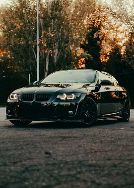 Sleek Black Car on Asphalt