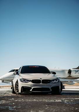 BMW M3 with Private Jet Backdrop