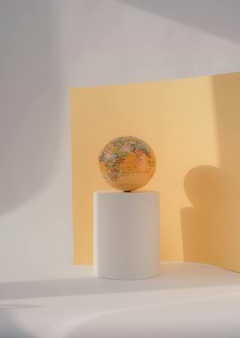 Globe on a White Pedestal