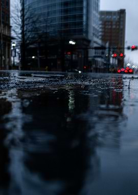 Rainy City Street Reflection