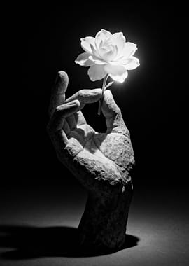 Stone Hand Holding White Flower