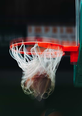 Basketball Going Through Hoop with Motion Blur