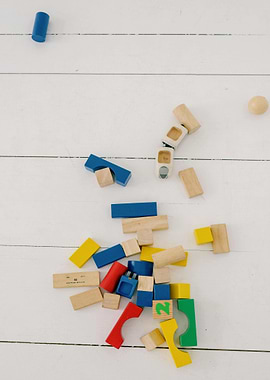 Colorful Wooden Building Blocks on White Surface