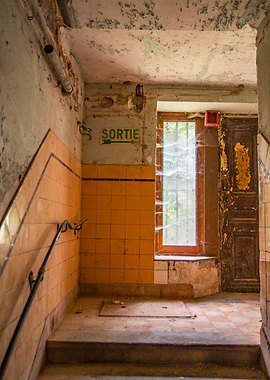Abandoned Building Interior with Exit Sign