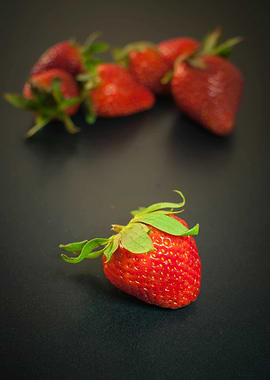 Fresh Strawberries on Dark Surface