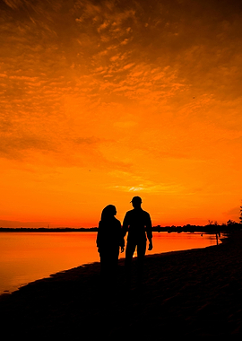 Silhouette of couple at sunset