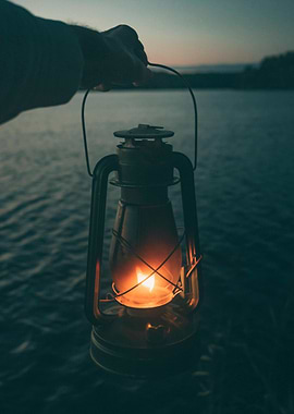 Lantern by the Water at Dusk