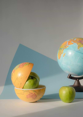 Globe, Apples, and a Slice of Earth
