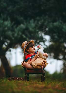 Girl with Duck in Garden