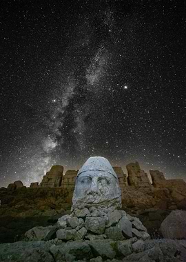 Stone Head Under Starry Night Sky