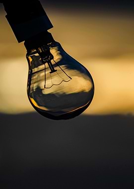 Hanging Lightbulb Silhouette at Sunset