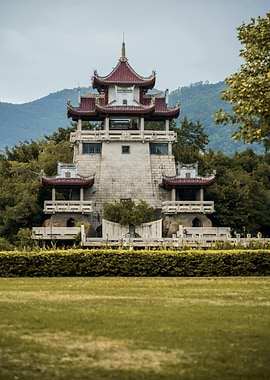 Asian Pagoda Tower in Green Landscape