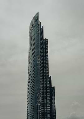 Modern Skyscraper Against Overcast Sky