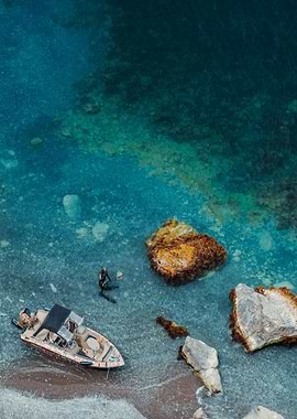 Coastal Scenery with Diver and Boat
