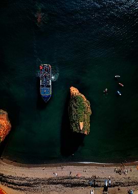 Aerial View of a Boat and Coastline