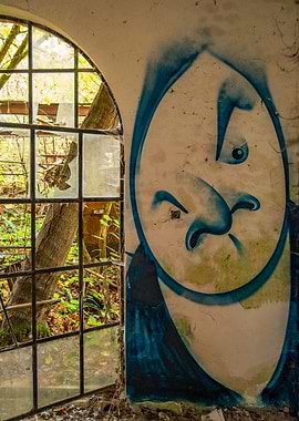 Graffiti Portrait in Abandoned Building