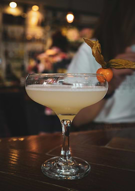 Elegant Cocktail with Physalis Garnish