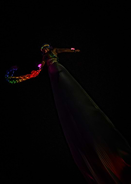 Performer with LED lights in the dark